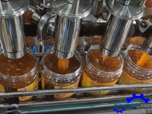 Máy chiết rót bốn vòi tự động tích hợp chức năng vặn nắp chai