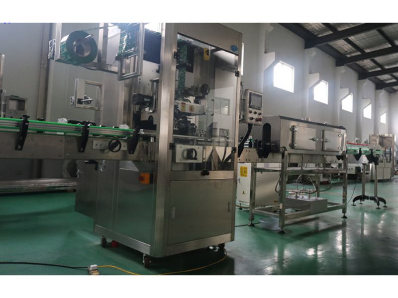 Máy phóng nhãn màng co thân lon tự động