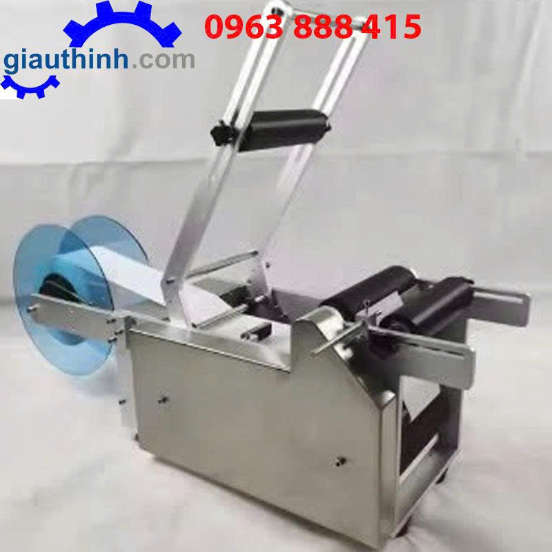 Máy dán nhãn decal chai tròn