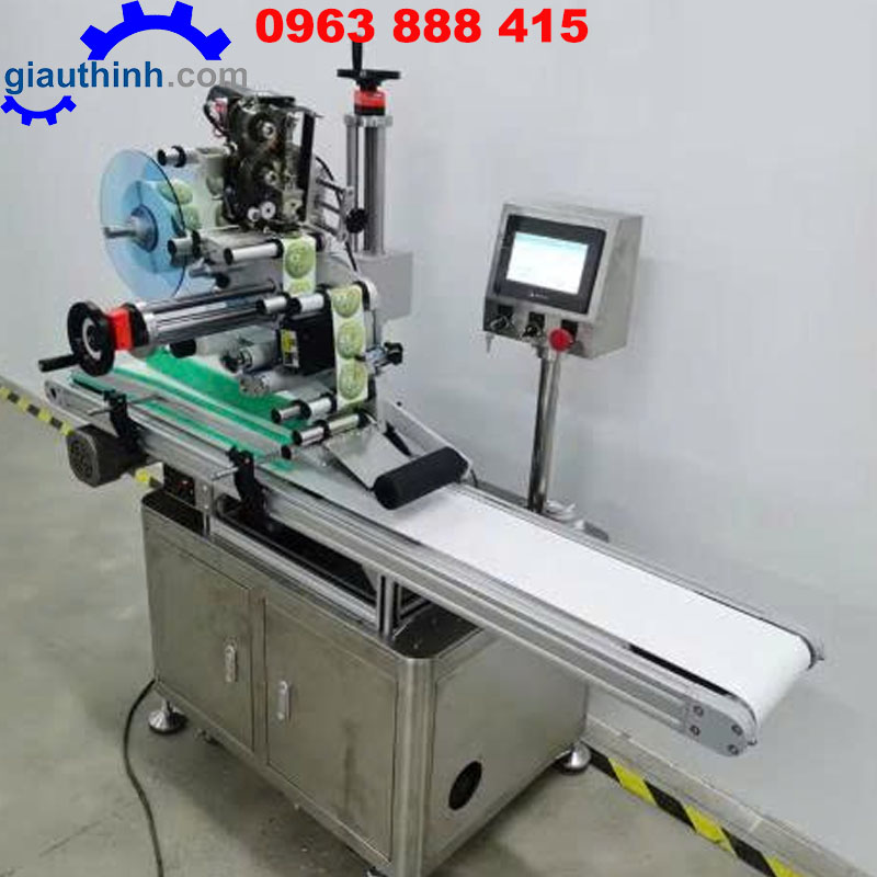 Máy dán nhãn chai dẹp