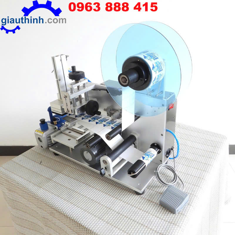 Máy dán nhãn chai dẹp
