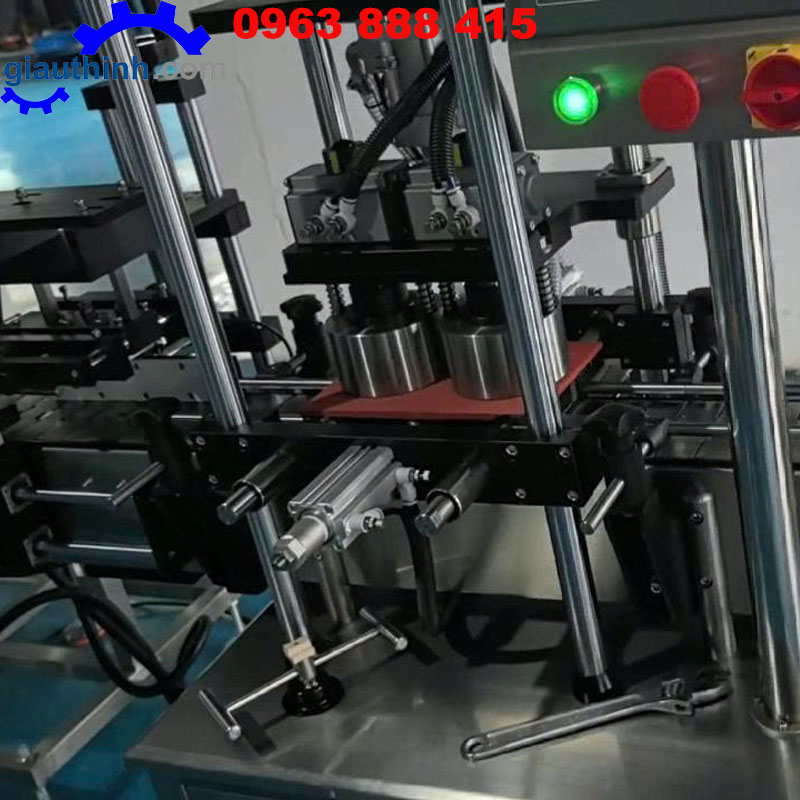 Máy siết nắp chai