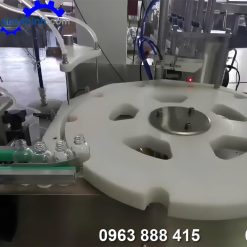 Máy dán nhãn chai tinh dầu