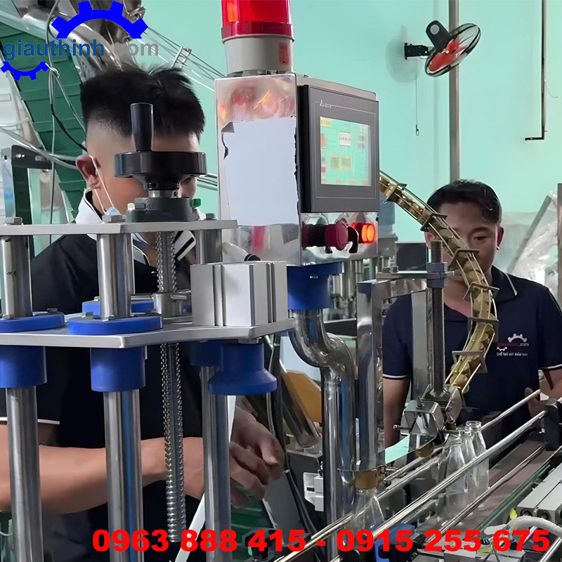 Máy siết nắp chai