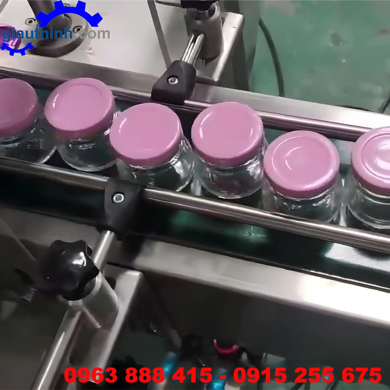Máy siết nắp chai hút chân không